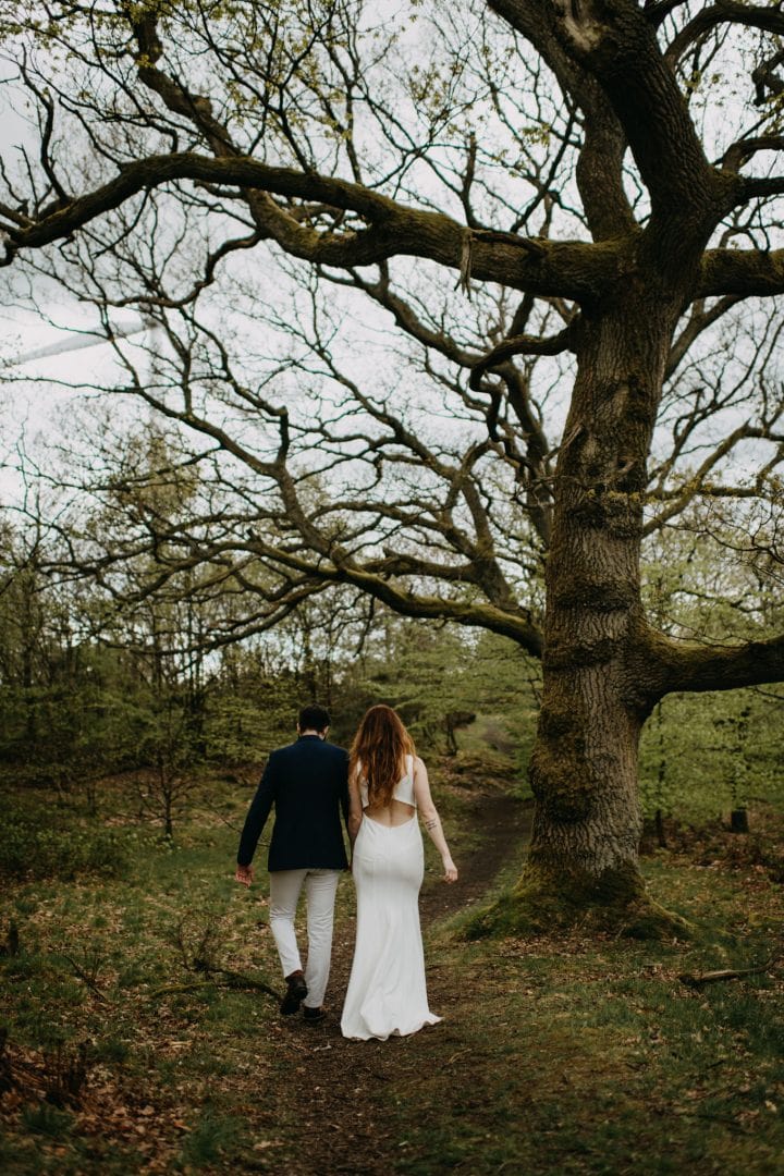 American couple eloping in Scottish Highlands