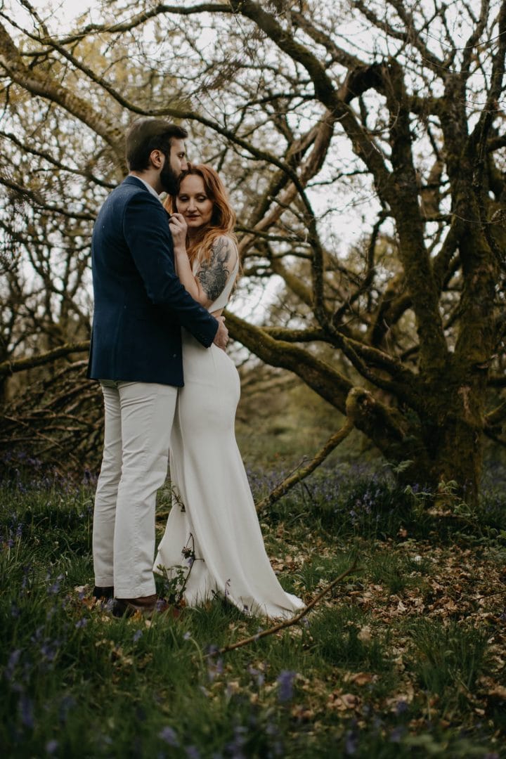Couple shoot in nature Scotland by trees. Lena Sabala and Patrick Zaarour on Mark Pacura workshop.
