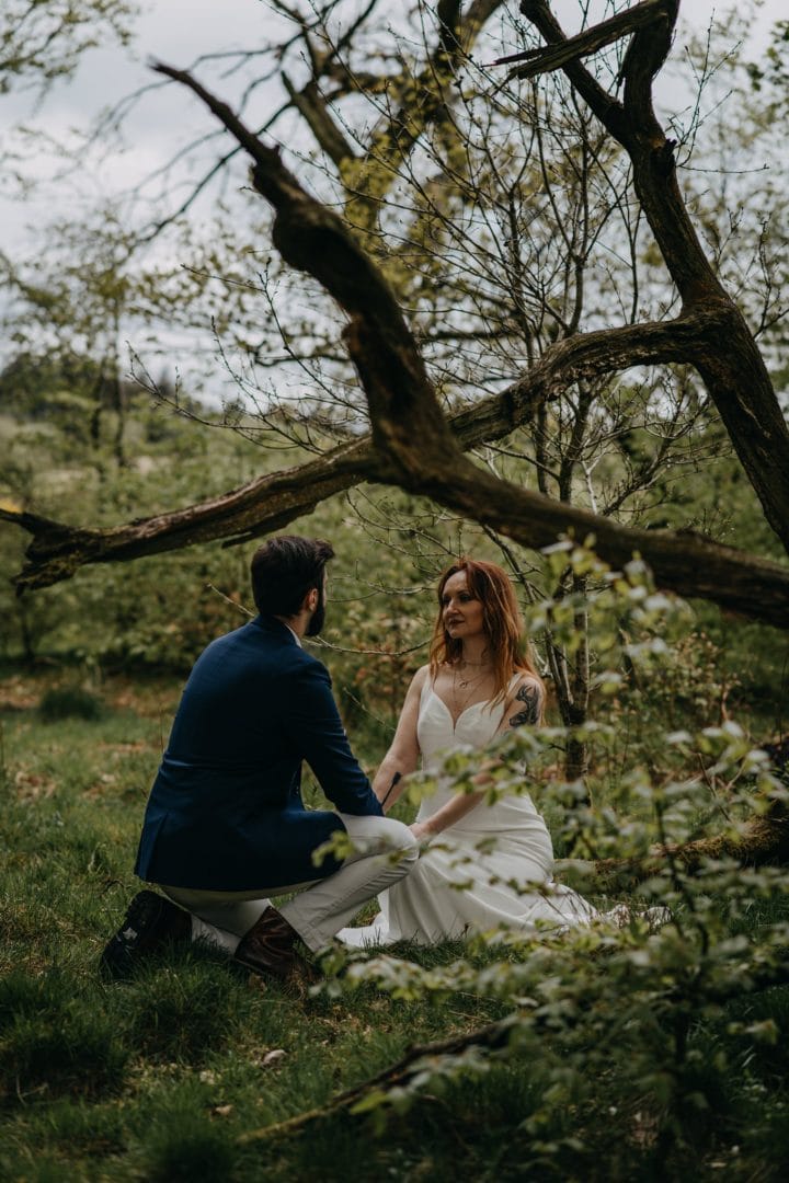 Elopement couples shoot in nature Scotland on vacation - making vows under tree