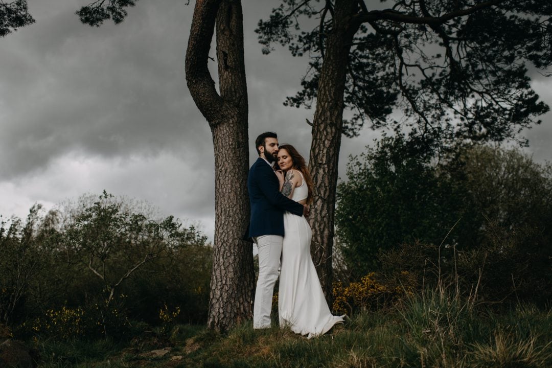 Elopement in nature Scottish Highlands. Stormy tree shot with Lena Sabala and Patrick Zaarour on Mark Pacura workshop.