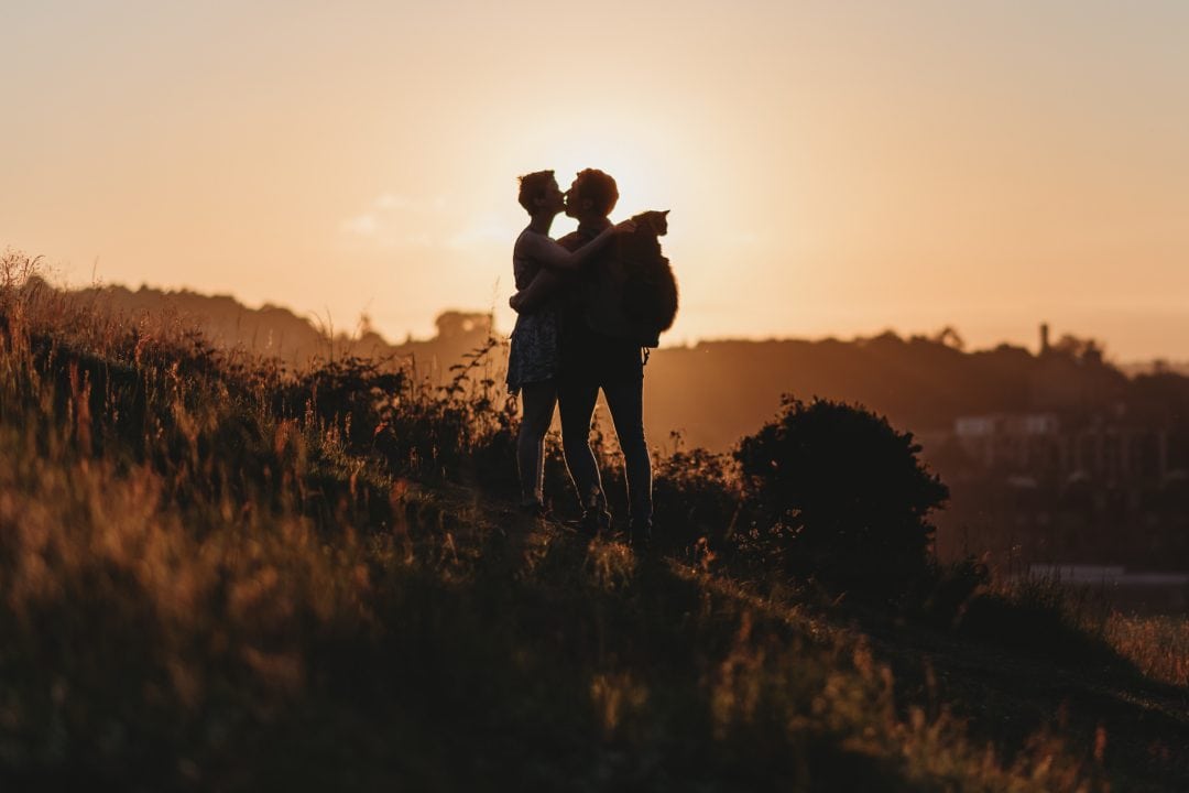 holyrood park, edinburgh sunset with romantic couple on connection session - hiking with mainecoon cat