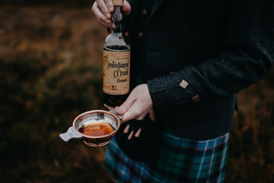 Quaich with lindisfarne mead in Glencoe - Scottish tradition
