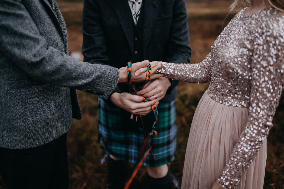 Handfasting cord in Glencoe by kilted celebrant - elopement commitment ceremony