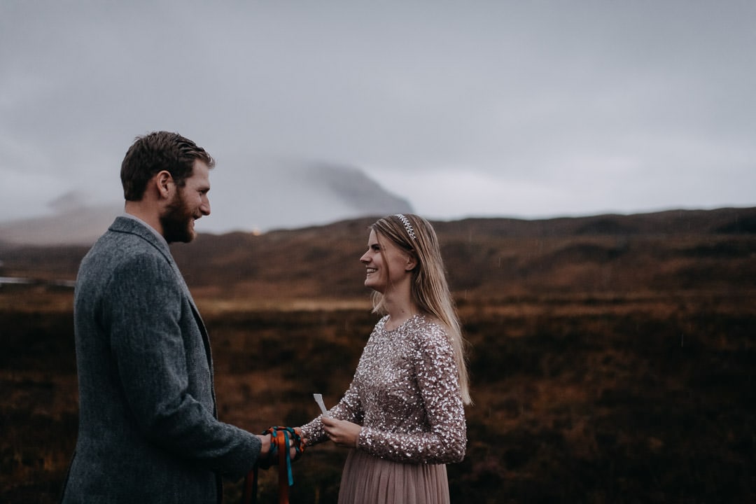 Happy elopement vows in moody foggy Glencoe - Scottish Highlands