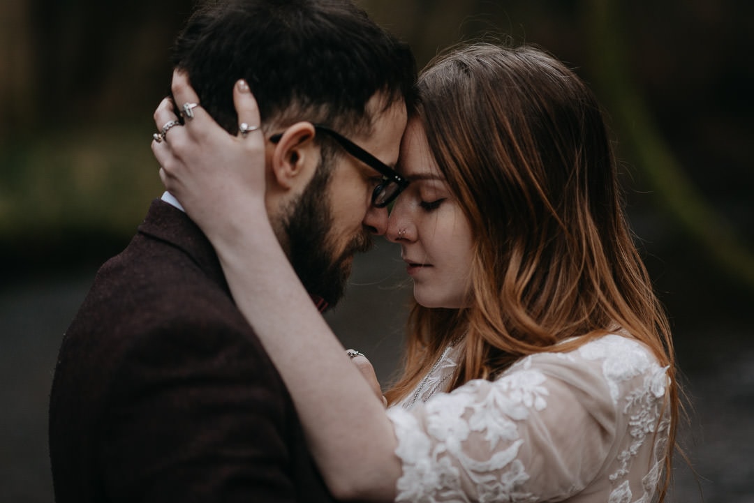 Intimate moment in Scottish elopement in the woodland