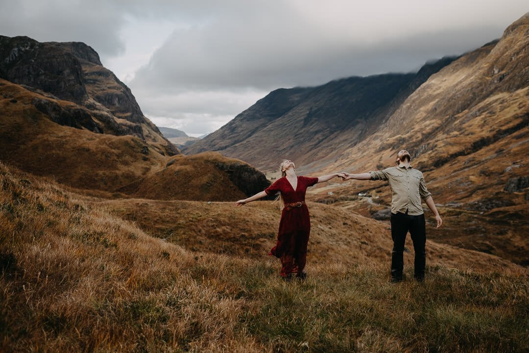 Artistic fine art photo of an engaged couple in Glen Coe with epic view