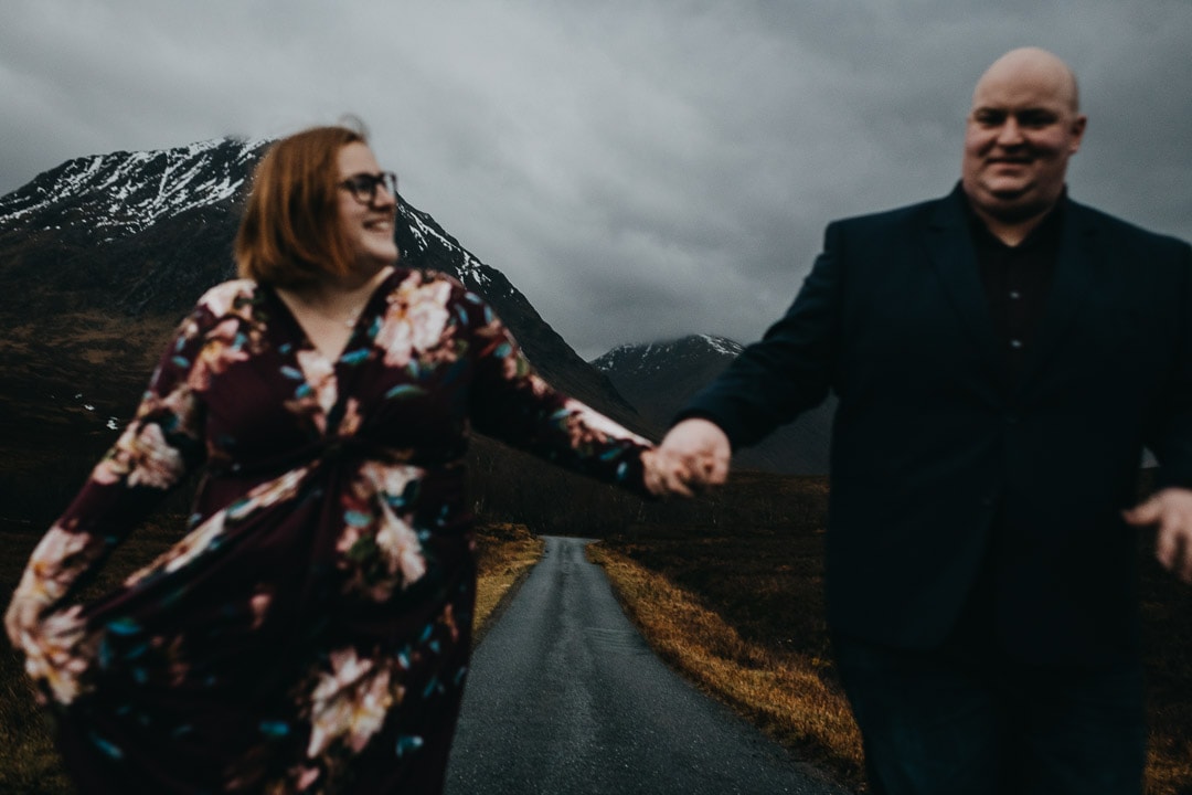 holding hands on the roads to Glen Etive, backdrop to Skyfall