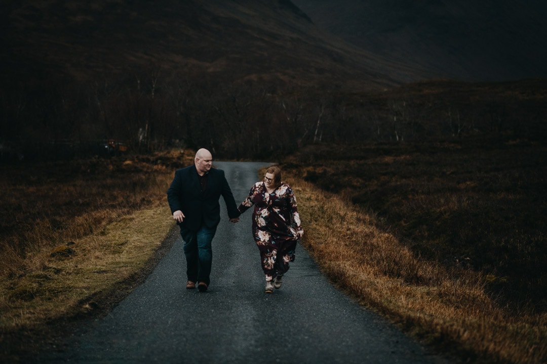 holding hands on the roads to Glen Etive, backdrop to Skyfall