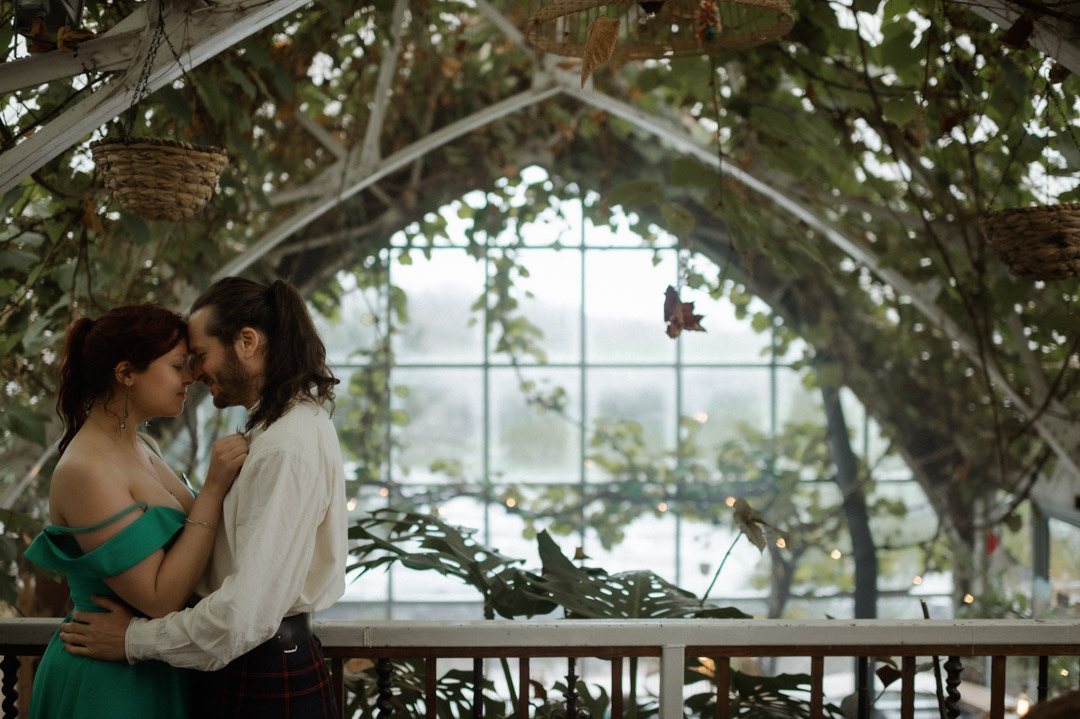 Isle of Mull cheese cafe couple cuddling after elopement