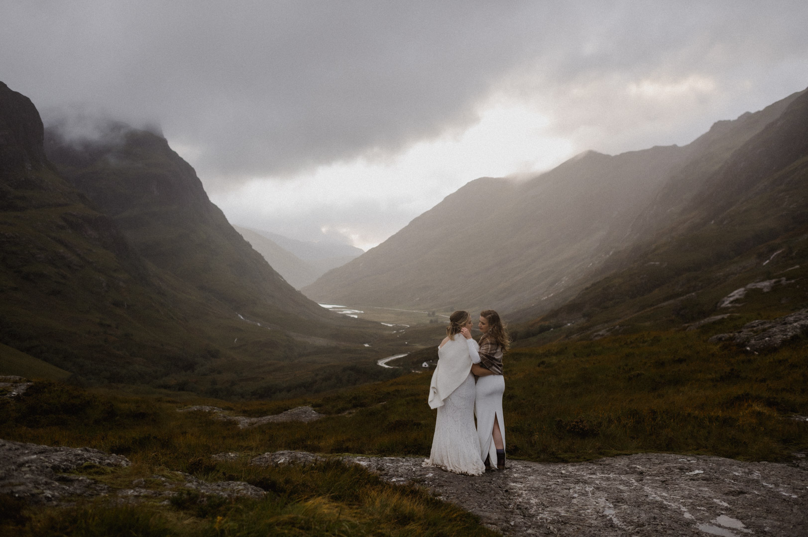 Glencoe elopement with stormy sunset - two brides