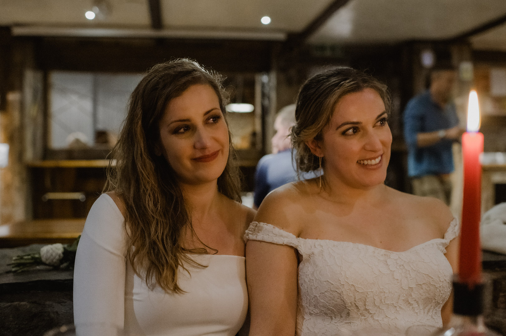 Friends and family welcoming same-sex couple to Clachaig Inn in Glencoe