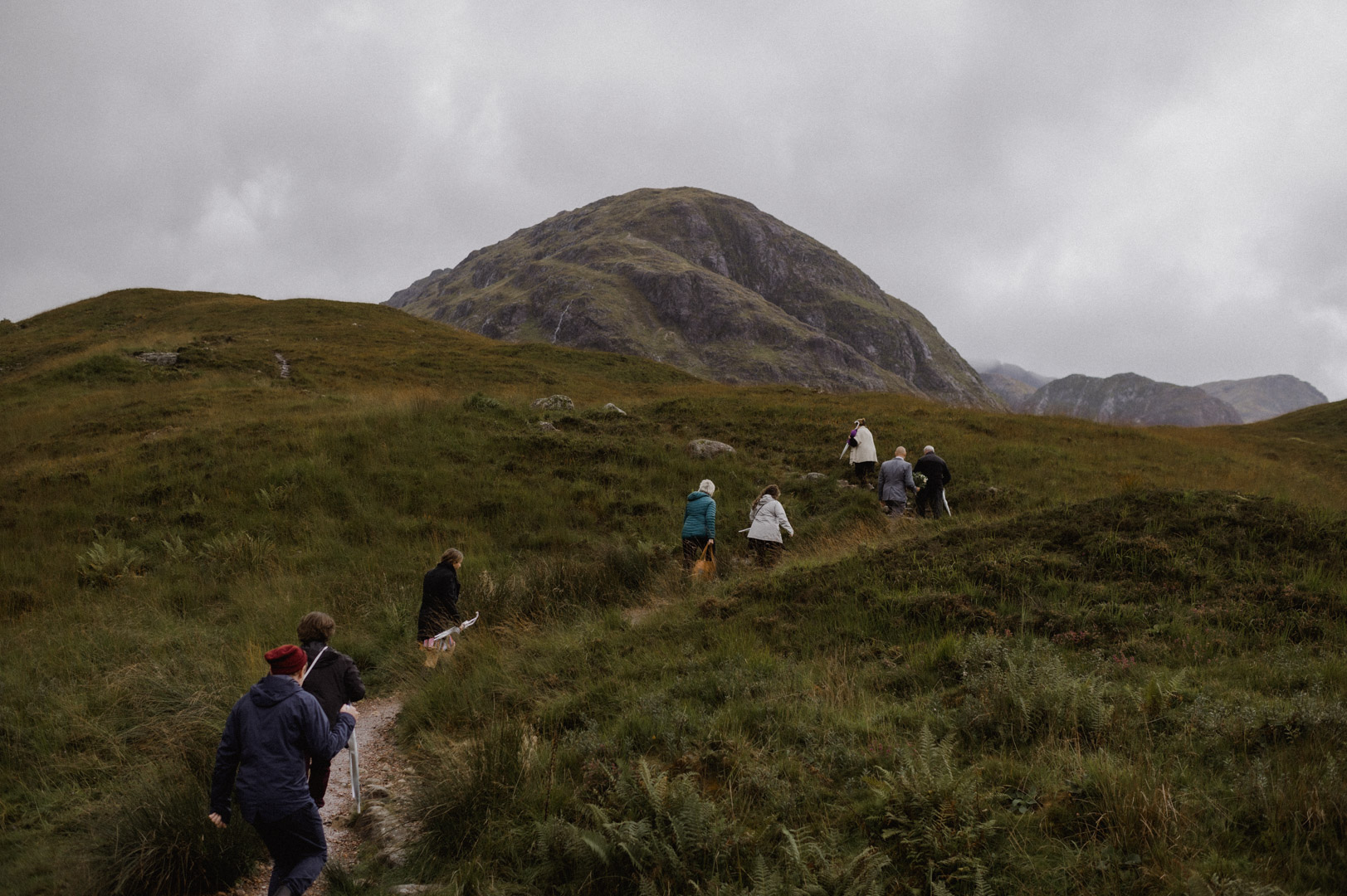 climbing hill to ceremony in Glencoe, Scotland