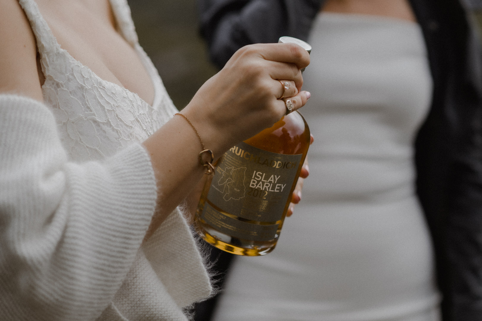 Whisky before elopement ceremony in Glencoe, Scotland