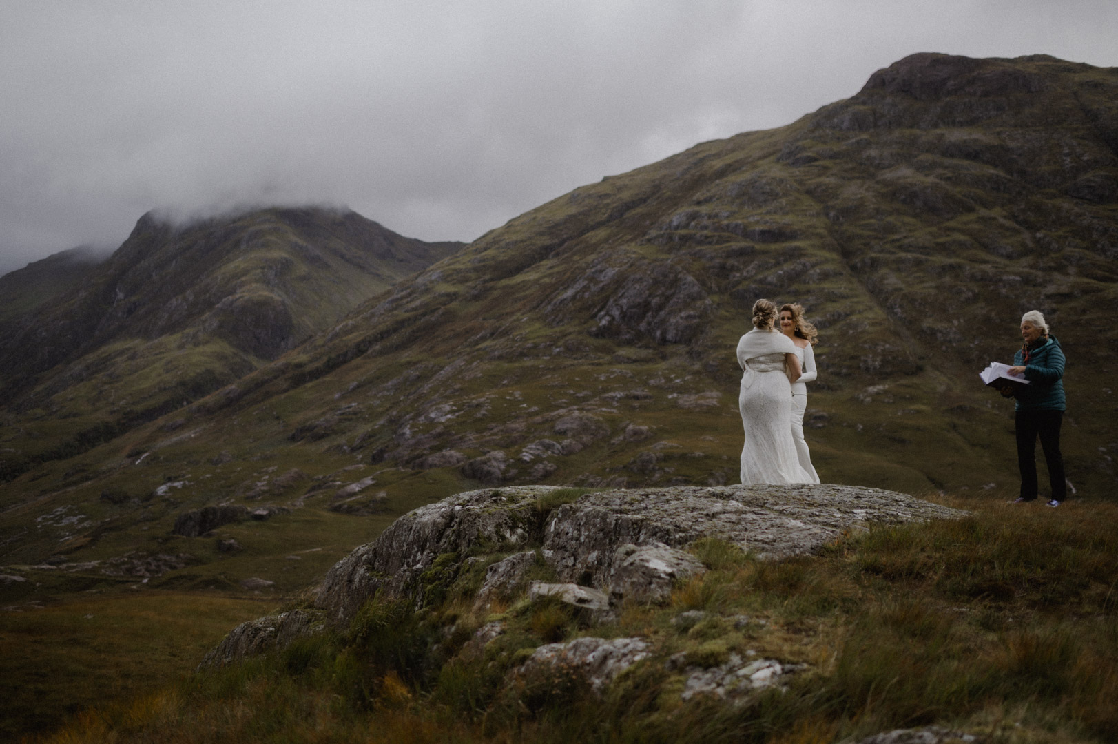 LGBTQ+ elopement ceremony in Glencoe during storm