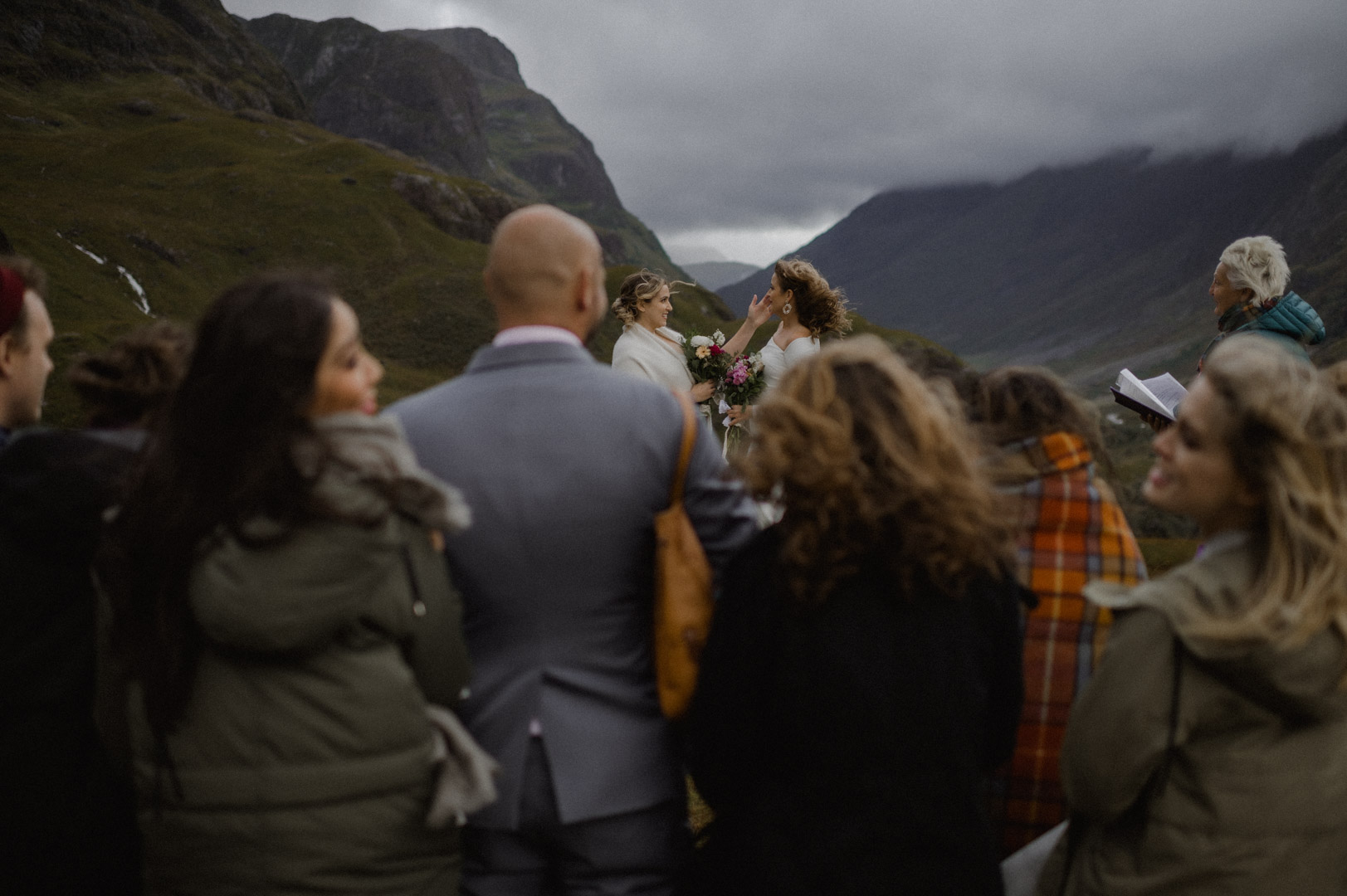 LGBTQ+ elopement ceremony in Glencoe during storm