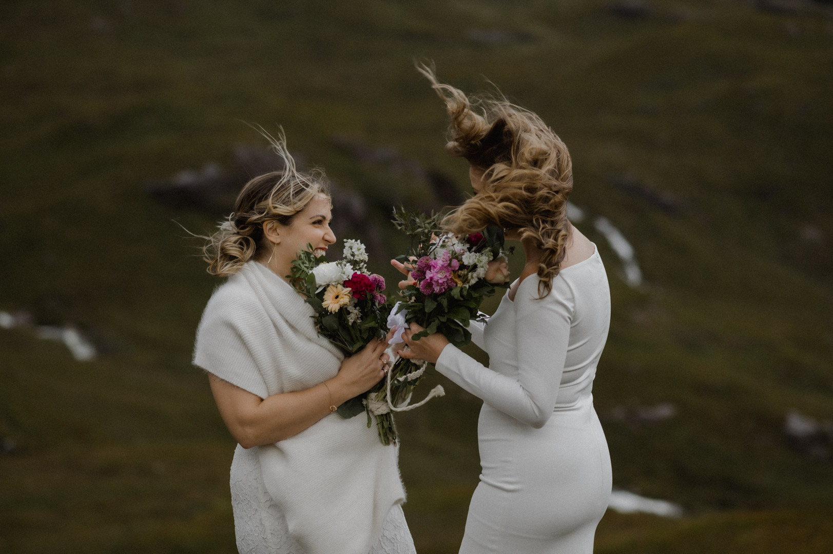 lesbian LGBTQ+ elopement ceremony in Glencoe during storm