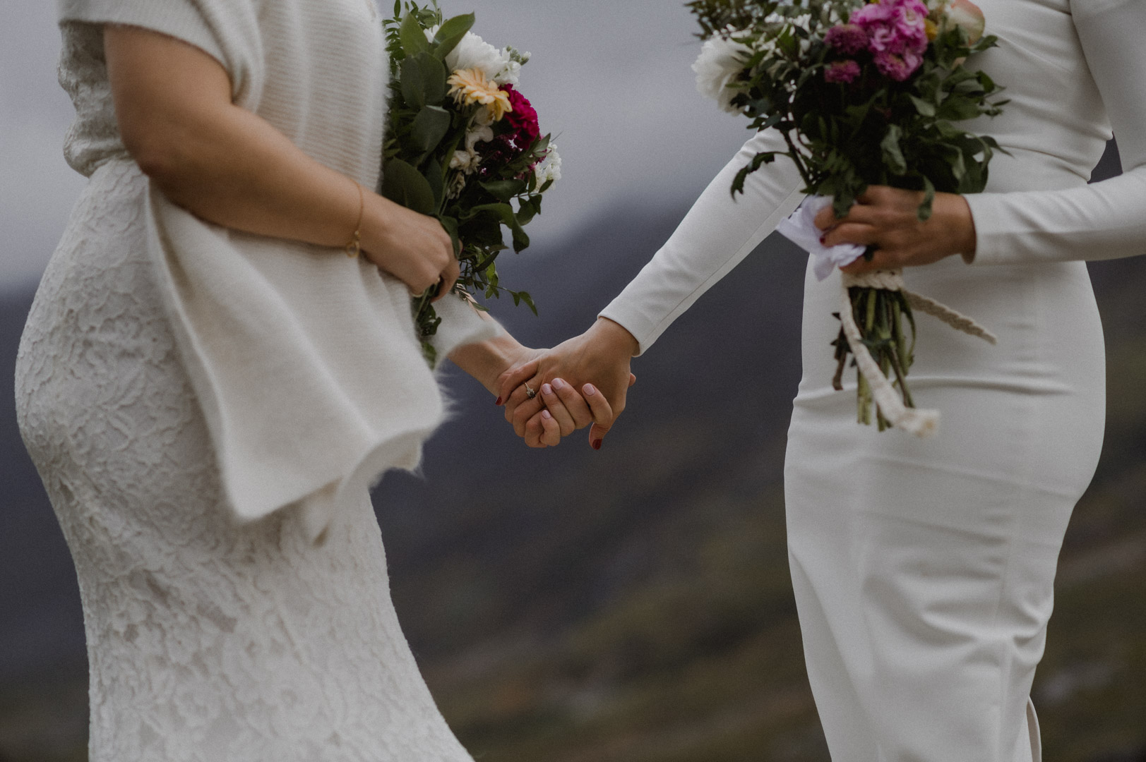Hands holding during elopement ceremony in Glencoe