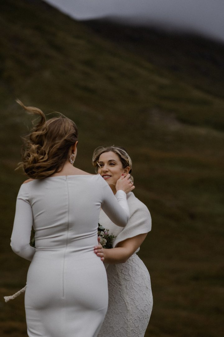 LGBTQ+ elopement ceremony in Glencoe during storm