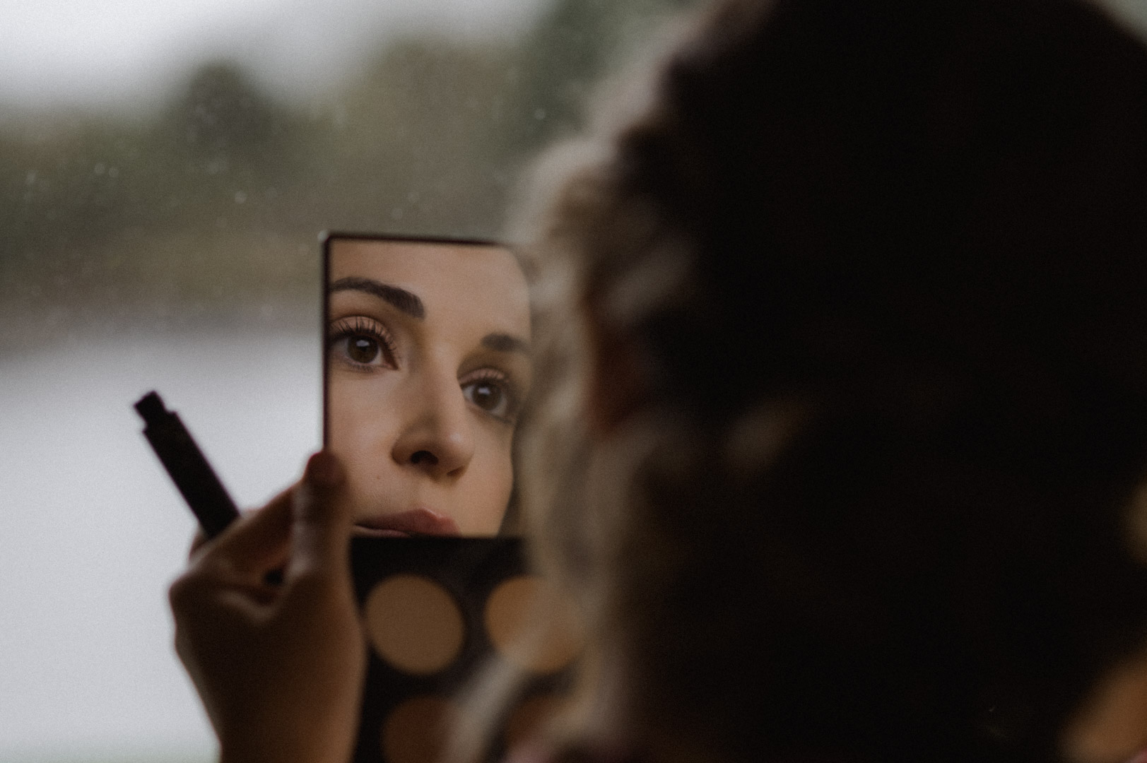 scotland elopement bride looking in mirror
