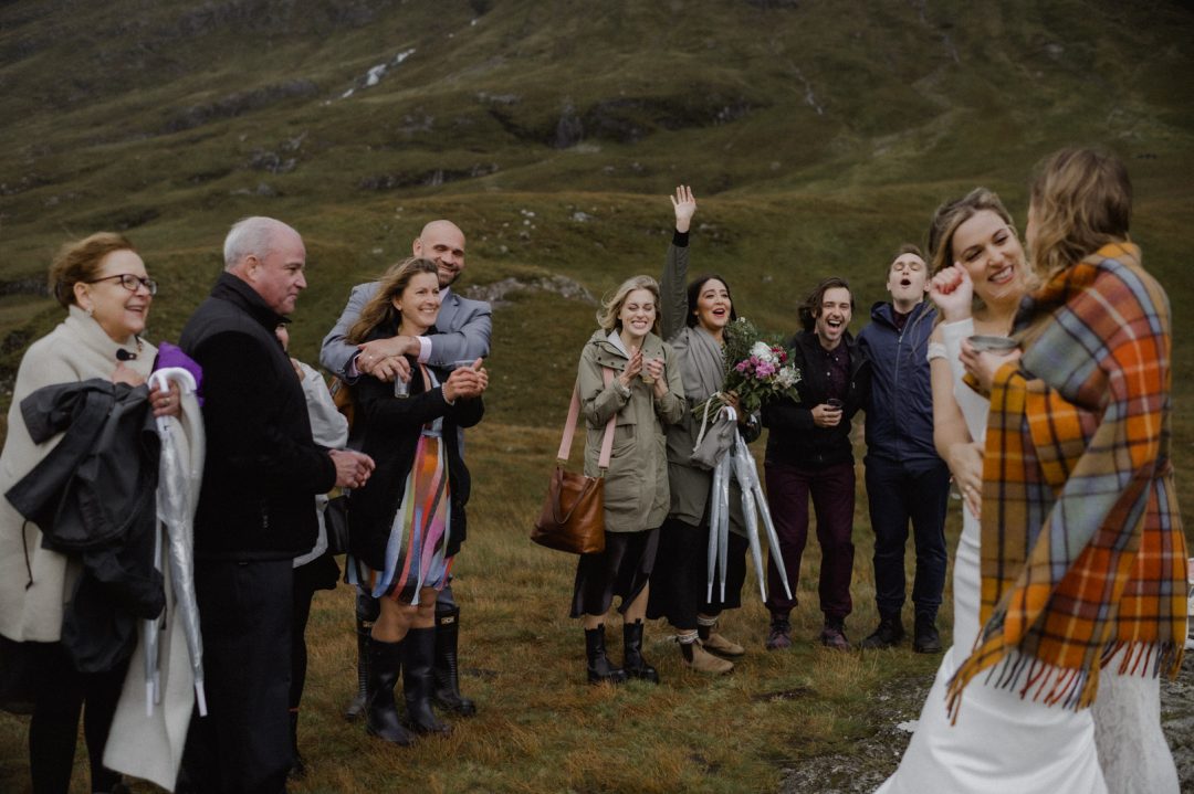 Family cheering during Glencoe elopement