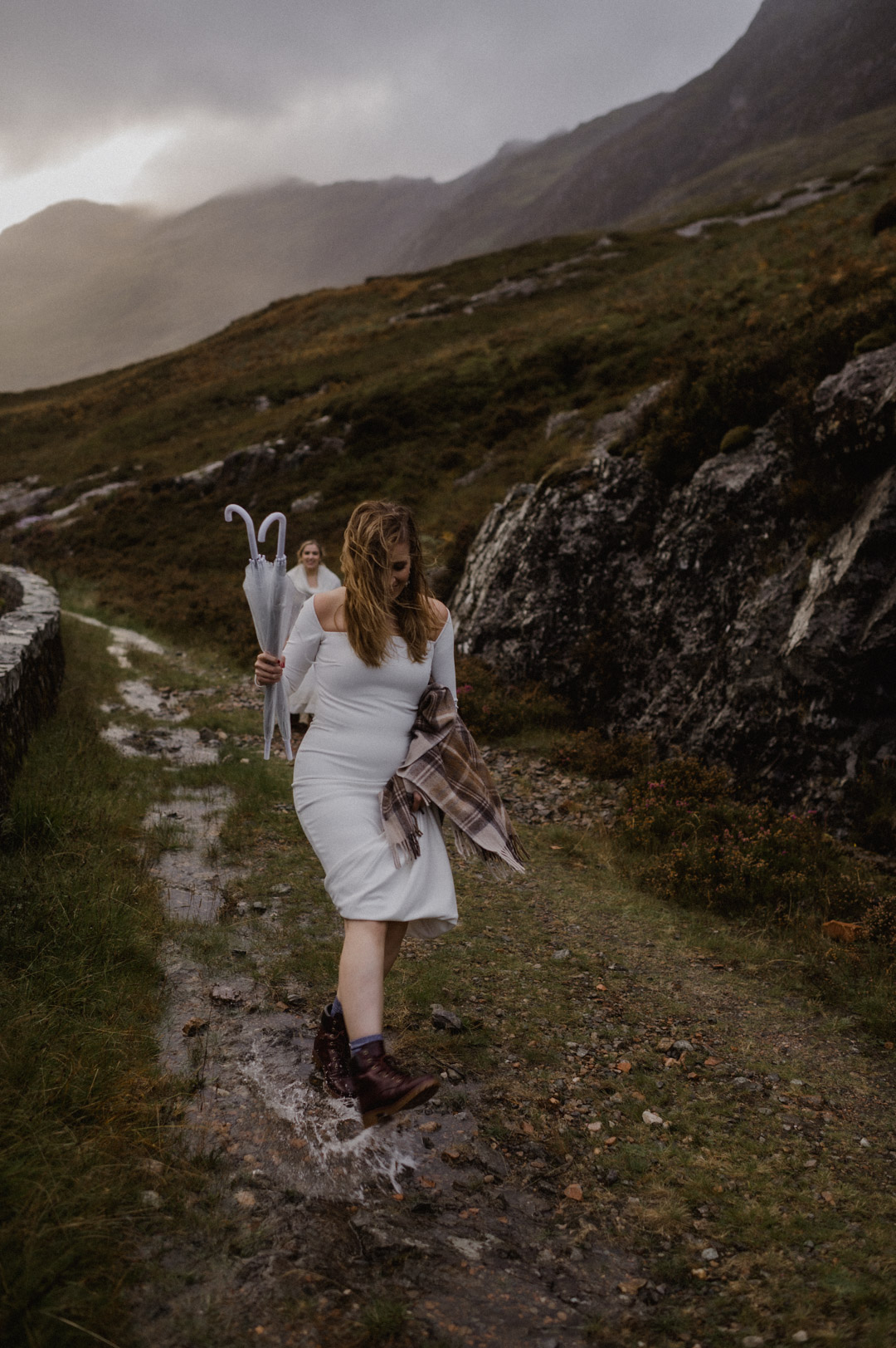 Bride kicks rain during Glencoe elopement