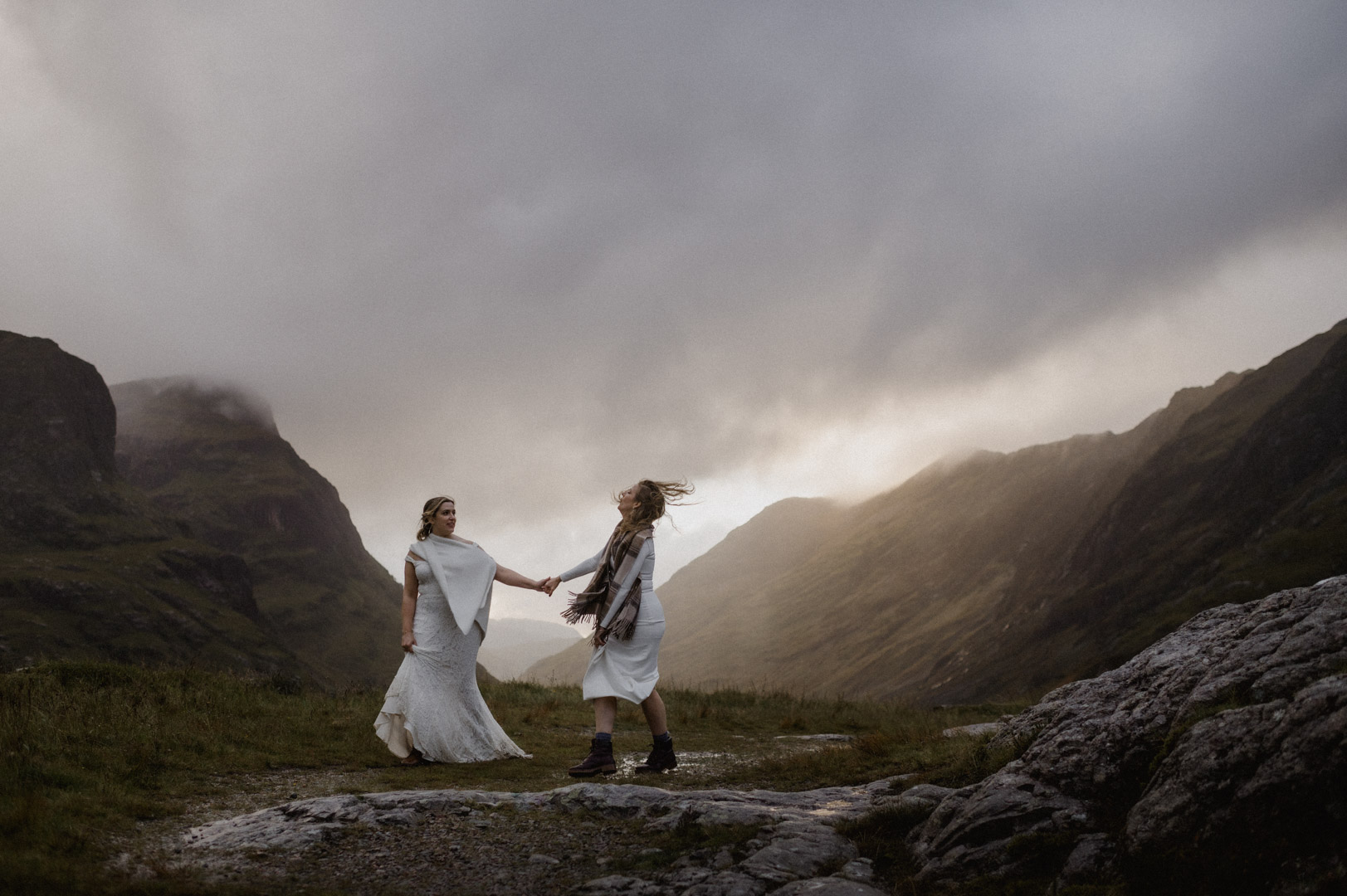 Glencoe elopement with stormy sunset - two brides
